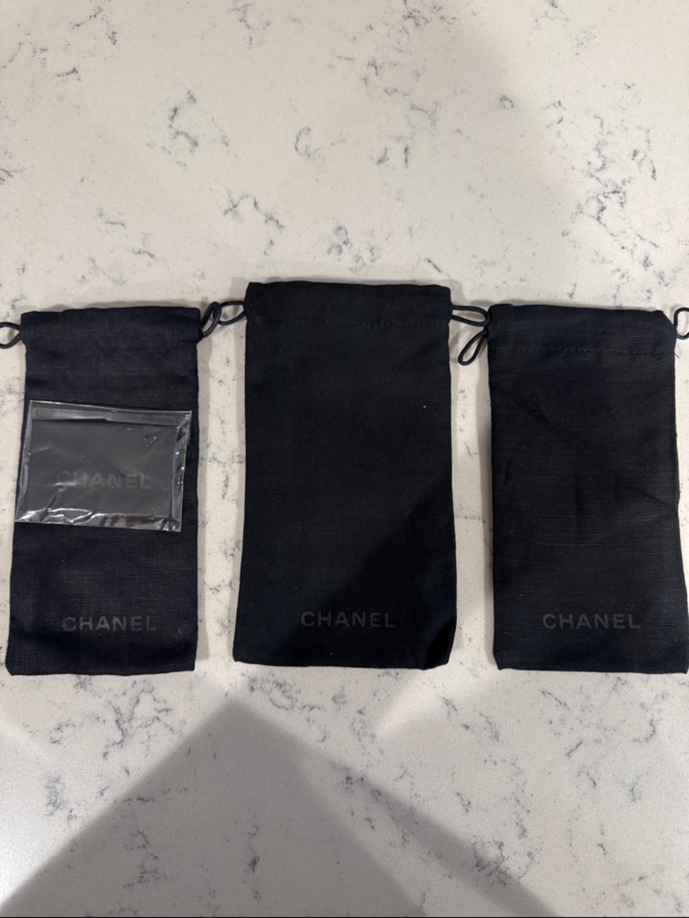 CHANEL Black Drawstring Pouch Set of Three